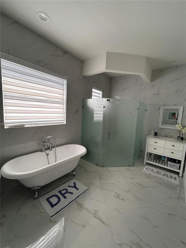 bathroom with separate shower and tub