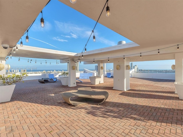 view of patio / terrace with a water view