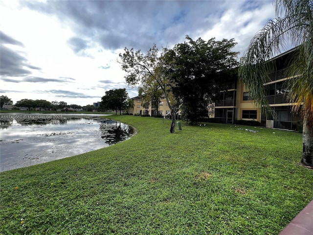 view of yard with a water view