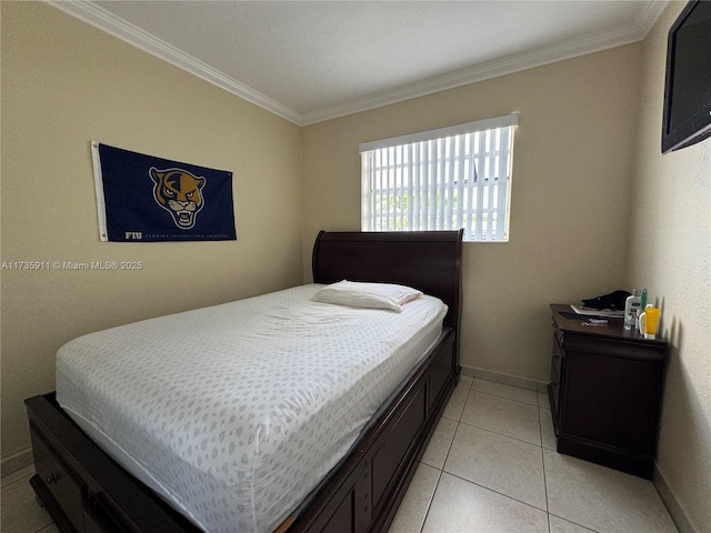 bedroom featuring light tile patterned floors and crown molding