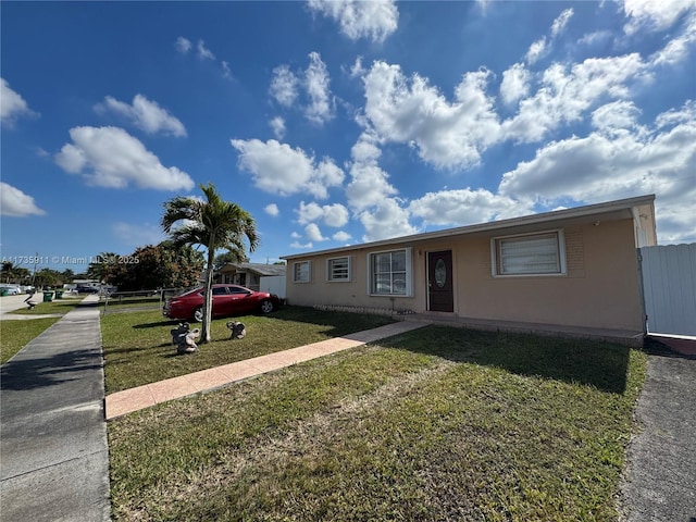 view of front of house with a front yard