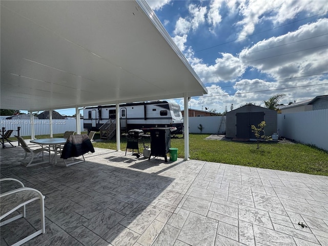 view of patio / terrace with a storage unit