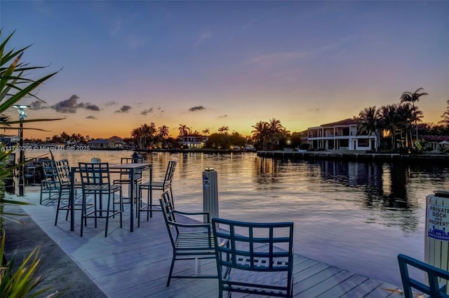 view of dock with a water view