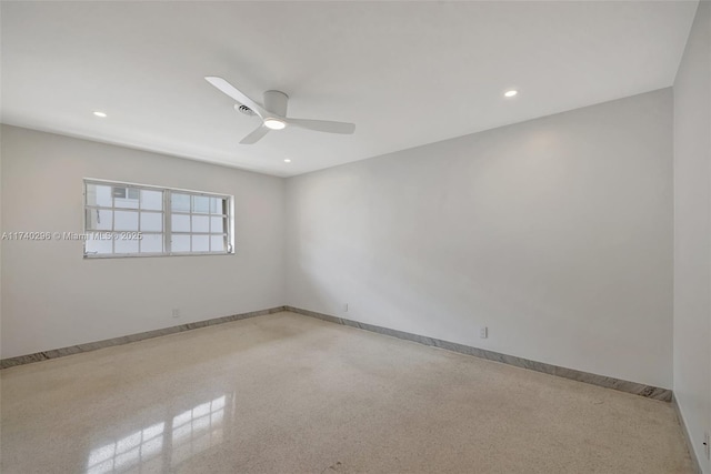 unfurnished room with ceiling fan