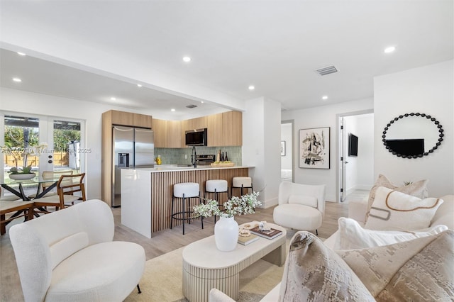 living room with light wood-type flooring