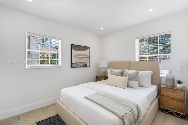 bedroom featuring light hardwood / wood-style floors