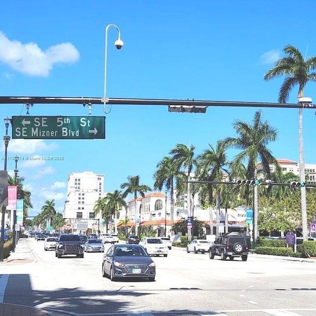 view of road featuring street lights