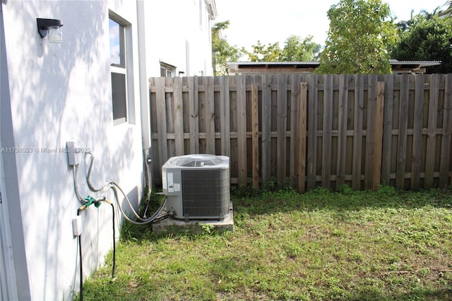 view of yard with cooling unit