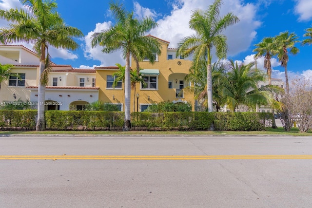 1799 NW 124th Way Unit 1799, Pembroke Pines, FL 33028 - view of building exterior featuring fence