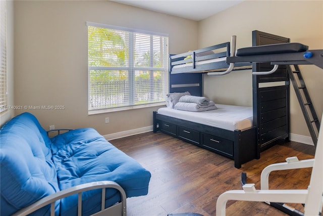 bedroom featuring dark wood-type flooring