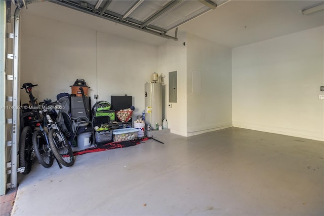 garage featuring gas water heater and electric panel