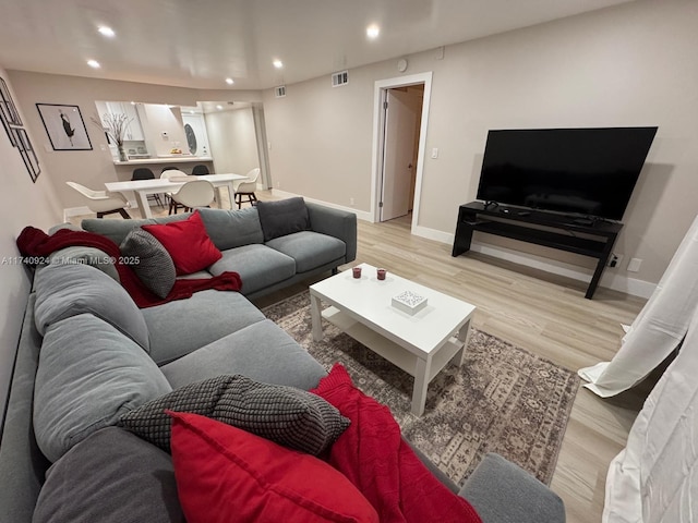 living room featuring light wood-type flooring