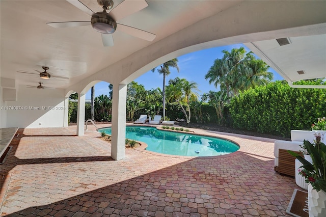 view of swimming pool featuring a patio and a fenced in pool