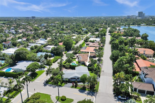 bird's eye view with a water view and a residential view