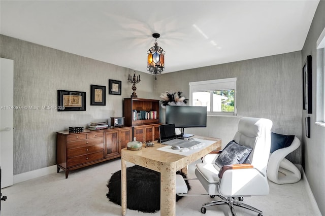 home office featuring light carpet, wallpapered walls, and baseboards