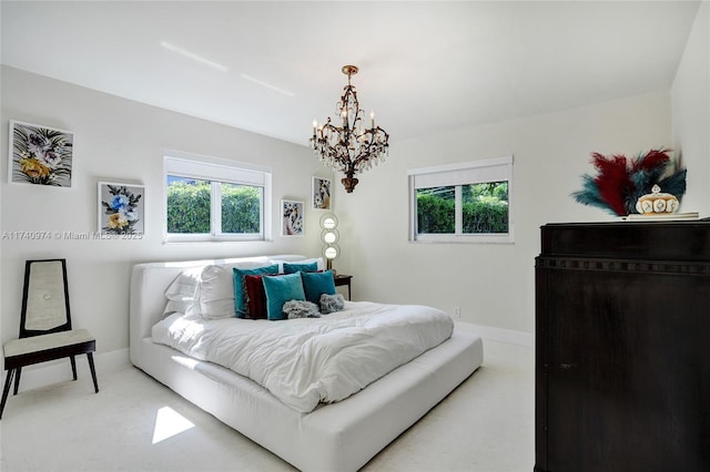 bedroom featuring baseboards, a chandelier, and light colored carpet