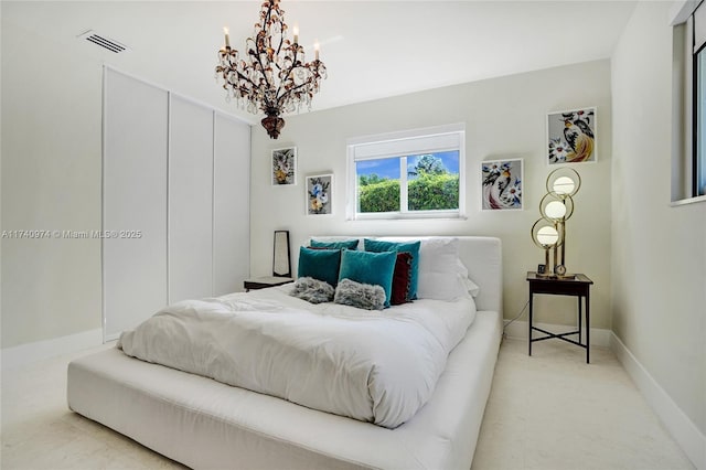 bedroom featuring visible vents and baseboards