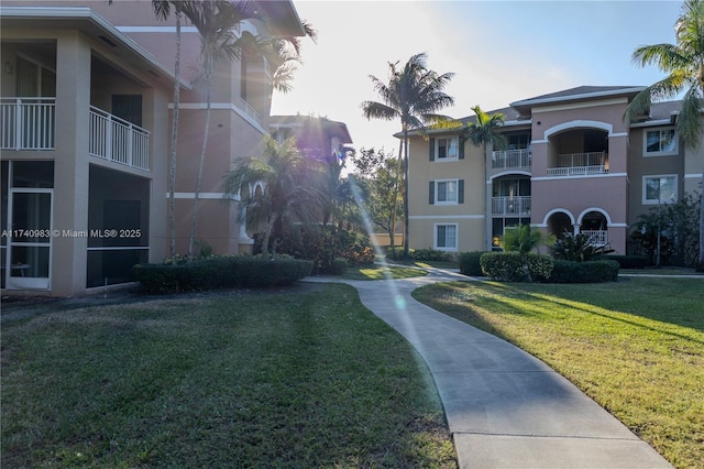 view of community featuring a lawn