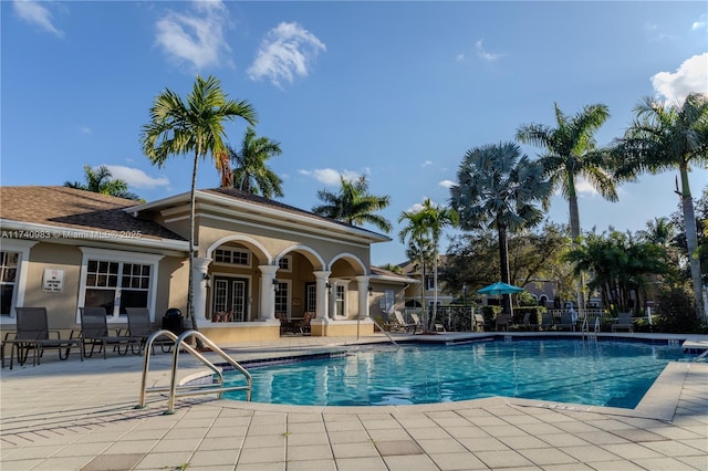 view of pool featuring a patio area