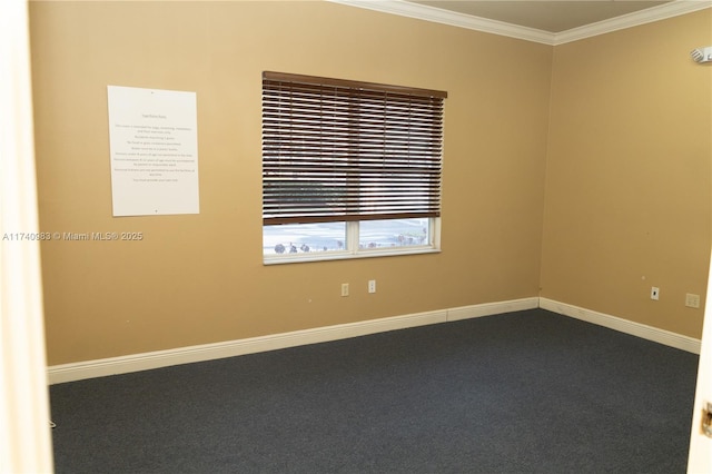 spare room featuring crown molding and dark carpet