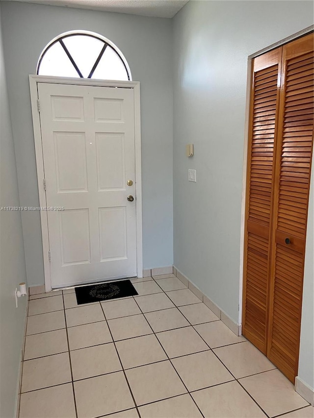 view of tiled foyer