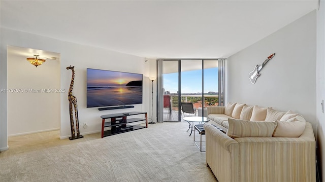 living room with expansive windows and light carpet