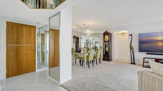 carpeted living room featuring a notable chandelier