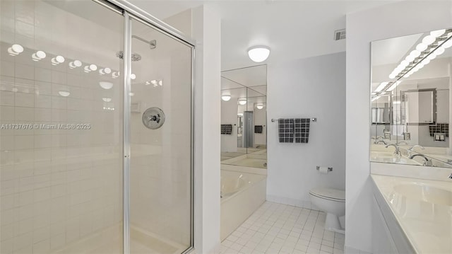 full bathroom featuring vanity, separate shower and tub, tile patterned floors, and toilet