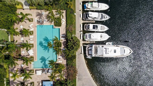 birds eye view of property featuring a water view