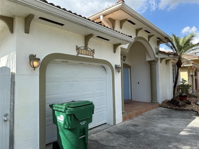 exterior space featuring a garage