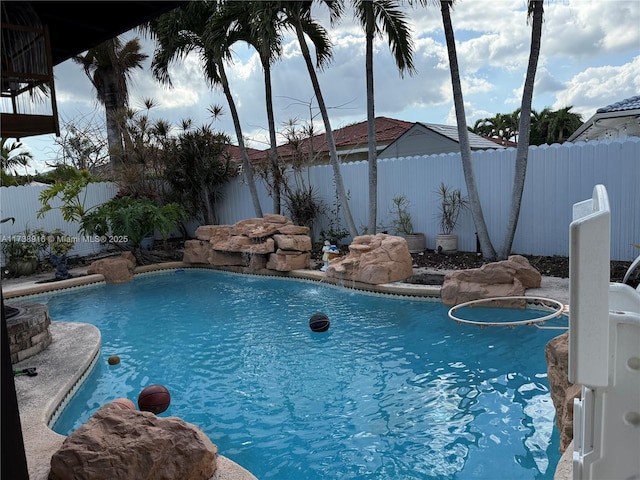 view of swimming pool featuring pool water feature