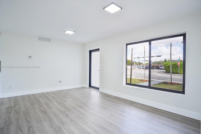 empty room featuring light hardwood / wood-style flooring