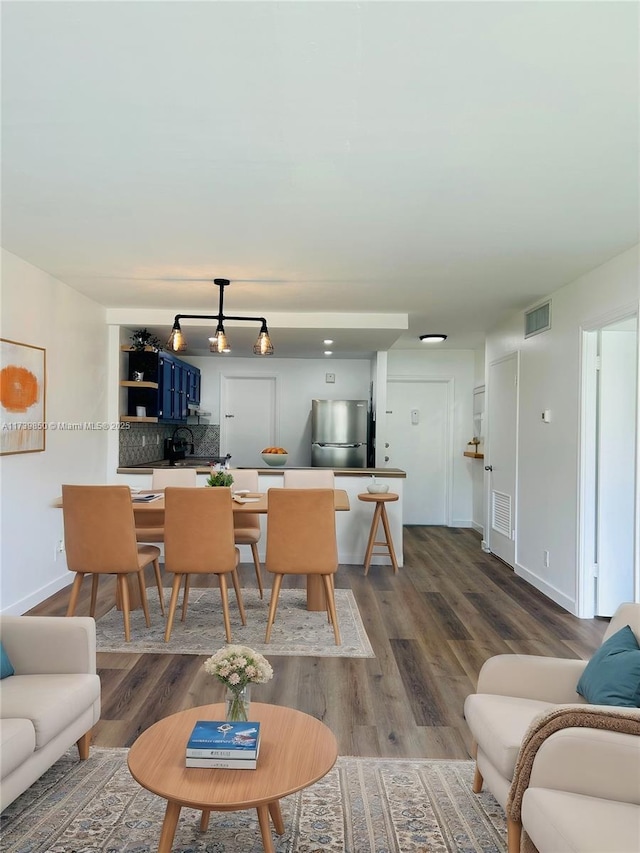 living room with hardwood / wood-style flooring