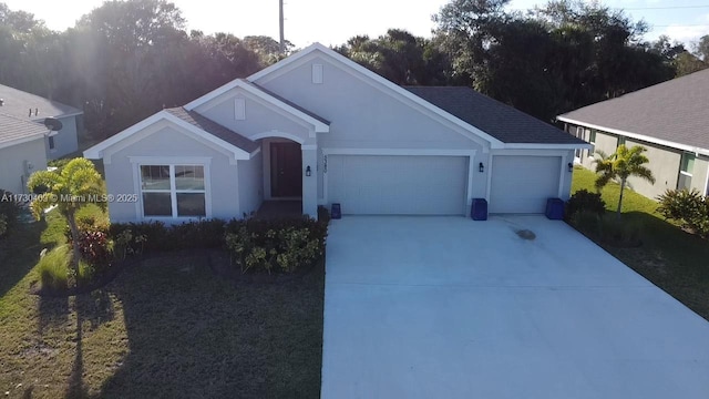 ranch-style house featuring a garage