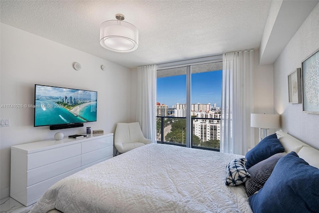 bedroom featuring a textured ceiling