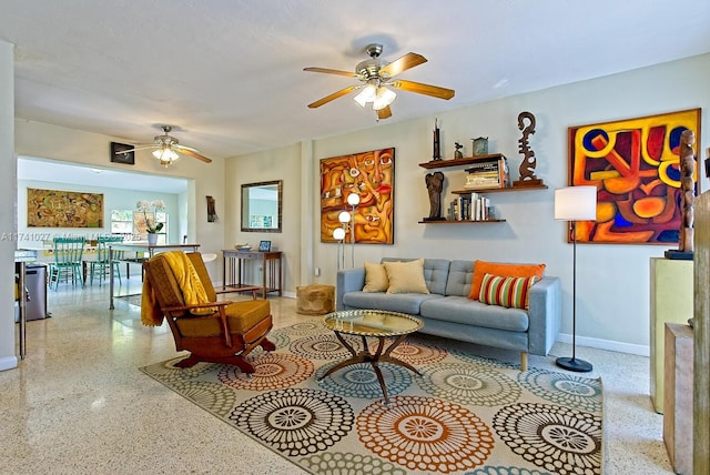 living room with ceiling fan