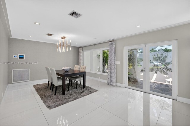 2816 NE 24th Pl, Fort Lauderdale, FL 33305 - tiled dining space featuring a chandelier, ornamental molding, and recessed lighting