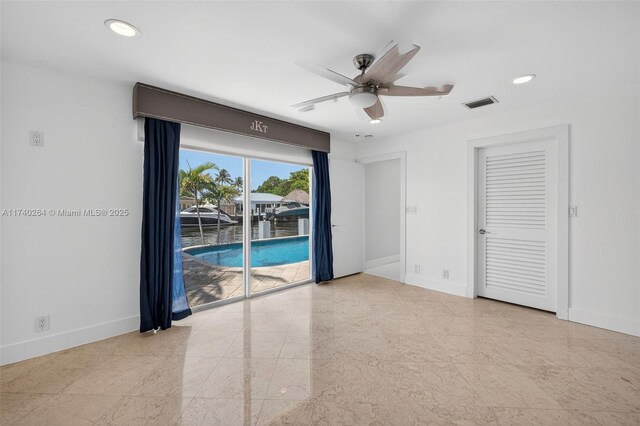 2816 NE 24th Pl, Fort Lauderdale, FL 33305 - unfurnished room with a ceiling fan and recessed lighting