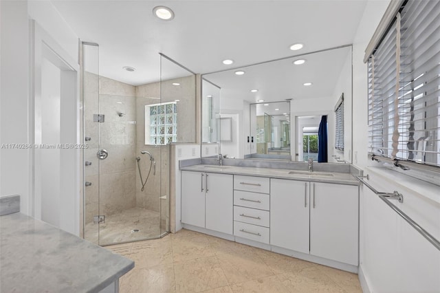2816 NE 24th Pl, Fort Lauderdale, FL 33305 - full bathroom featuring double vanity, a shower stall, recessed lighting, and tile patterned floors