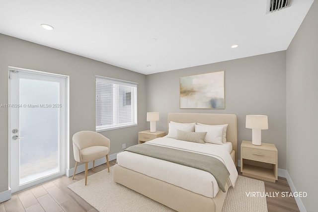 2816 NE 24th Pl, Fort Lauderdale, FL 33305 - bedroom with wood finished floors and recessed lighting