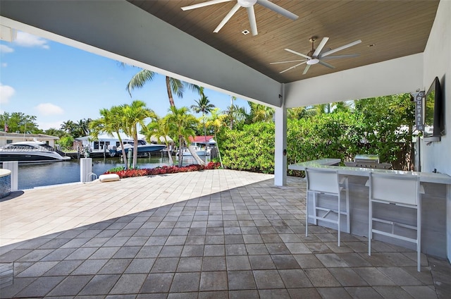 2816 NE 24th Pl, Fort Lauderdale, FL 33305 - view of patio featuring ceiling fan and a water view