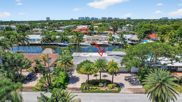 2816 NE 24th Pl, Fort Lauderdale, FL 33305 - drone / aerial view of a nearby body of water and city skyline