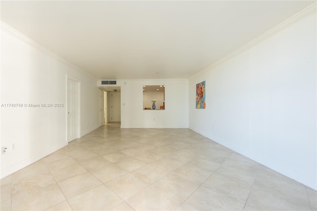 unfurnished room with ornamental molding