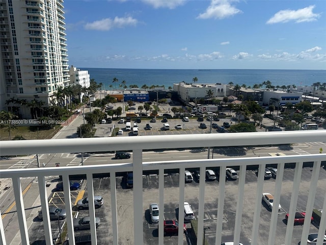 balcony featuring a water view