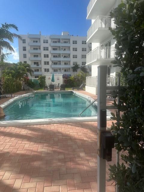 view of pool featuring a patio