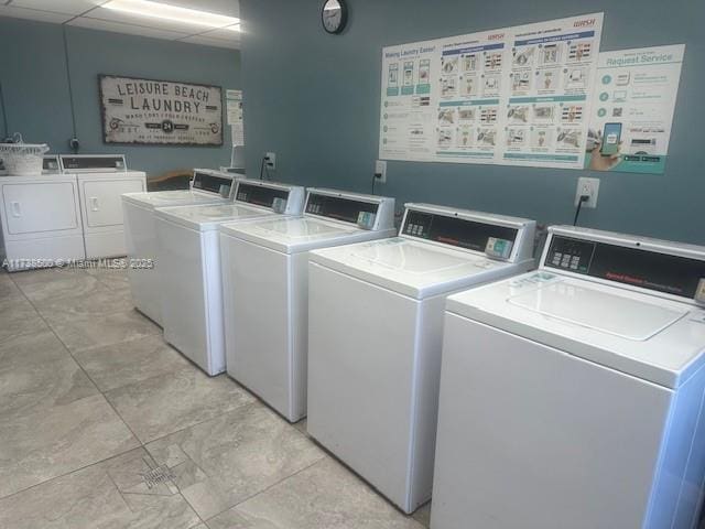 washroom with separate washer and dryer