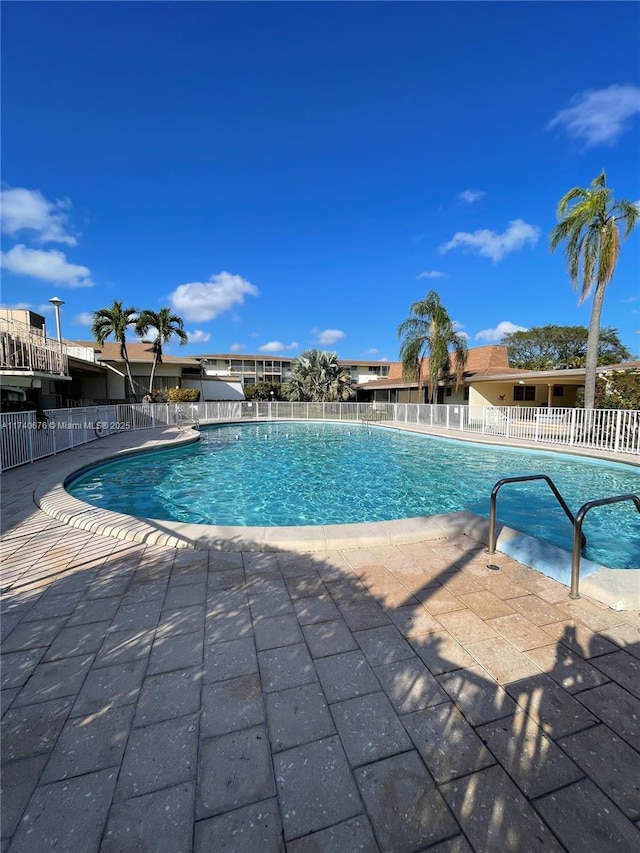 17090 NE 14th Ave Unit 314, Miami, FL 33162 - community pool featuring fence