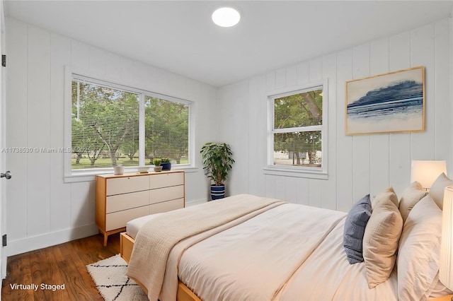 bedroom featuring dark hardwood / wood-style floors