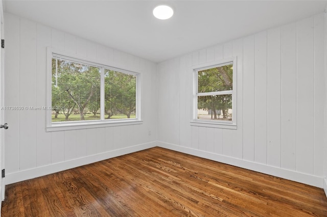 empty room featuring hardwood / wood-style floors