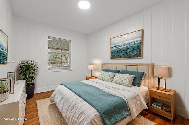 bedroom with wood-type flooring